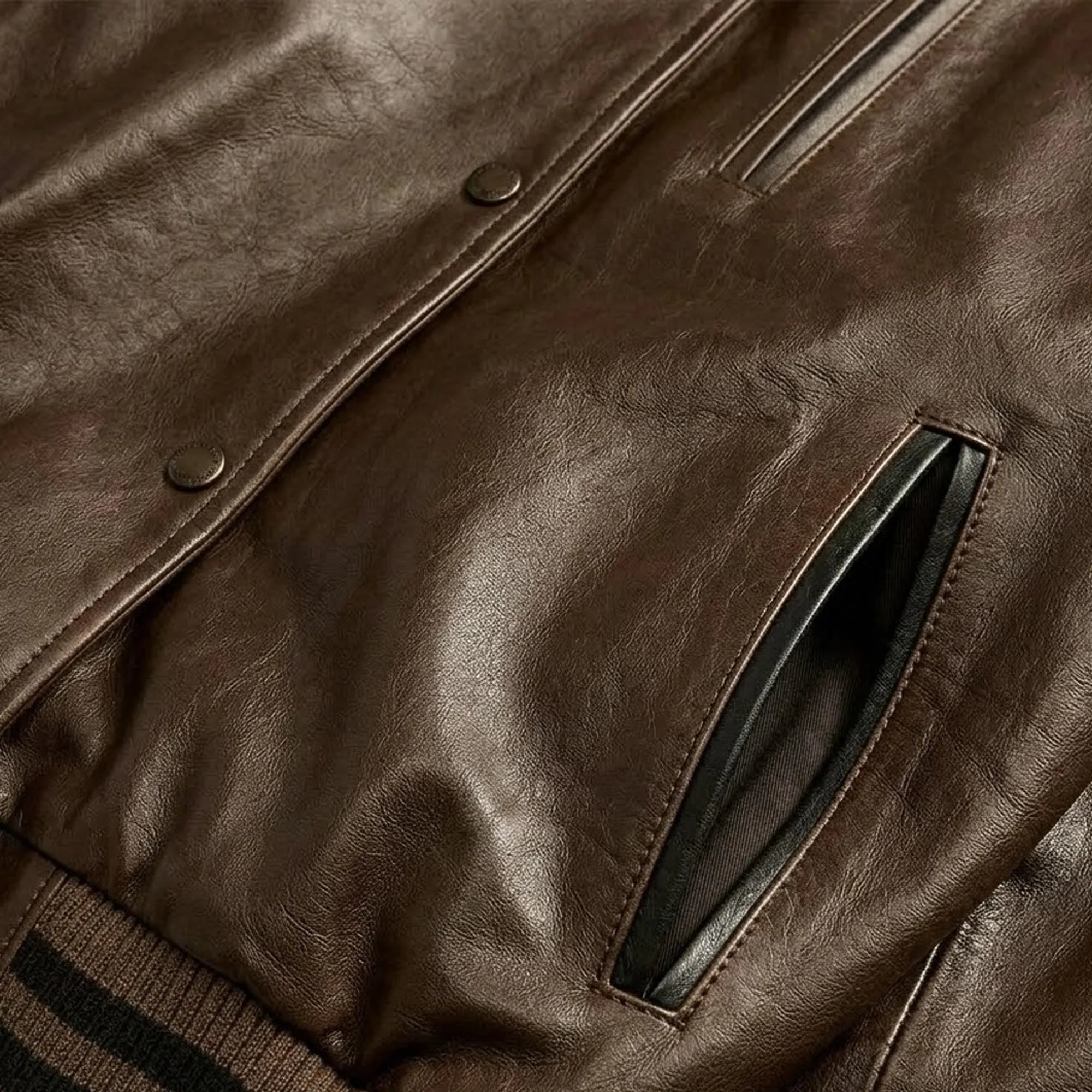 Men's brown varsity leather bomber jacket detail – RXD Leather