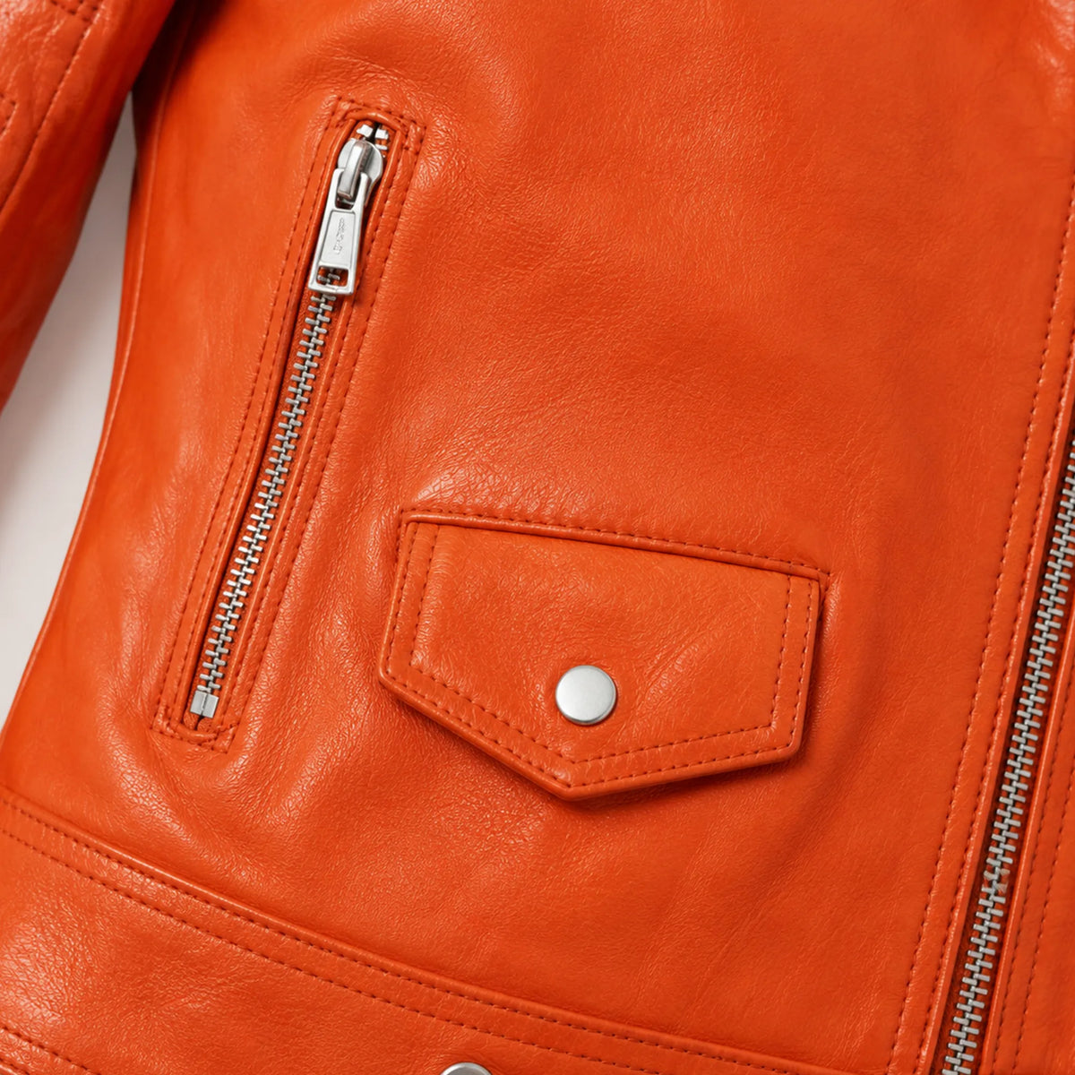 Women's orange leather biker jacket detail – RXD Leather